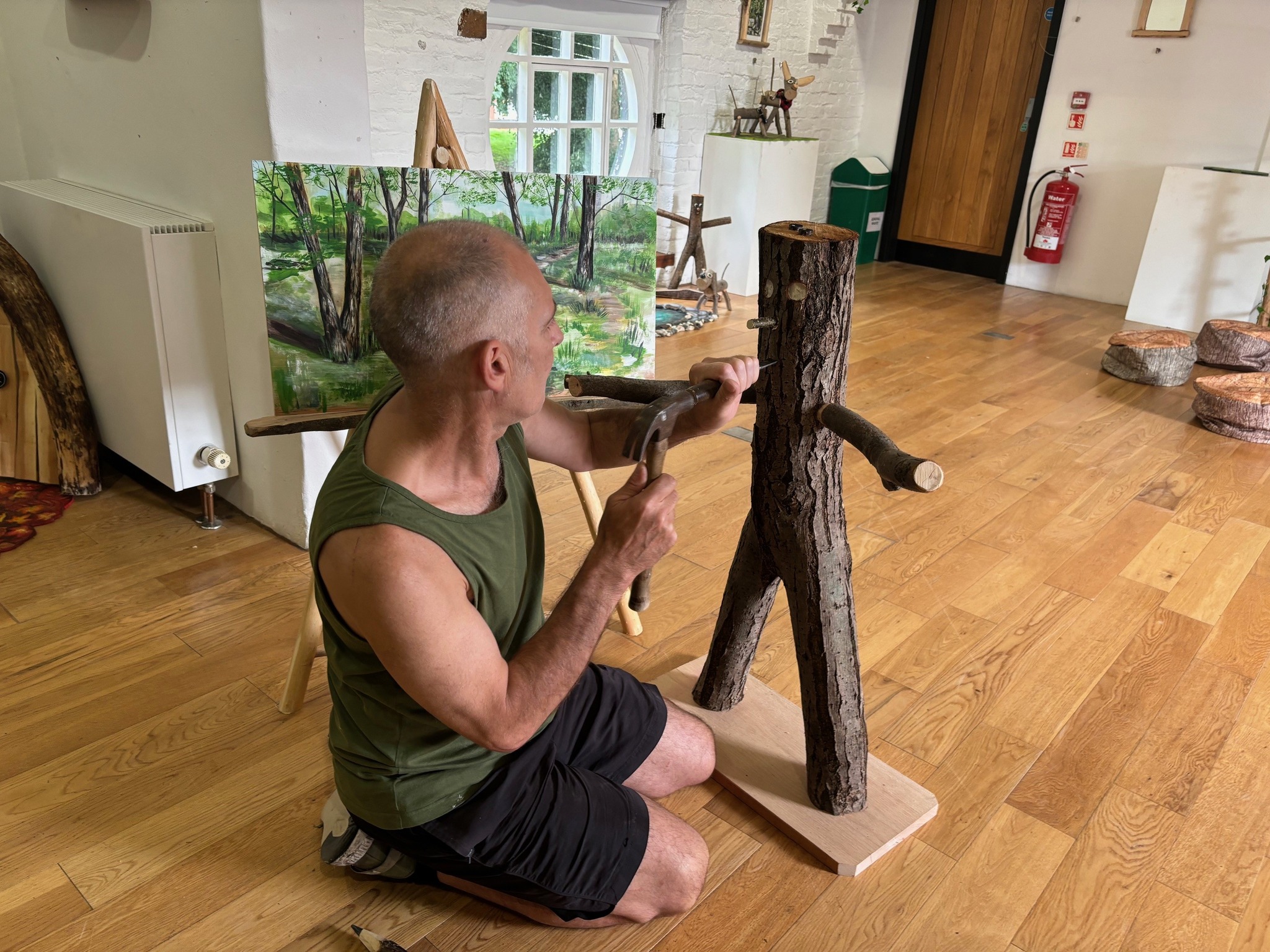 Artist working in the Coach House Gallery